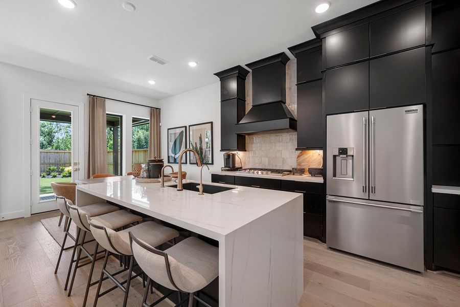 Furnished interior view inside a new home in The Highlands 50', Porter (Image 5).