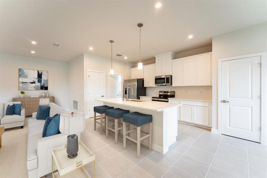 Representative furnished interior of a home built from the Harrison by Ryan Homes in The Palms at Venetian Bay, New Smyrna Beach (Image 3).