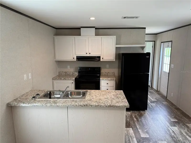 Furnished interior view inside a new home in , Lake Panasoffkee (Image 6). Furnished interior view inside a new home in , Lake Panasoffkee (Image 6).