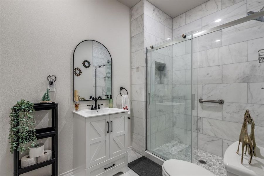 Full bathroom featuring vanity and a shower stall Full bathroom featuring vanity and a shower stall