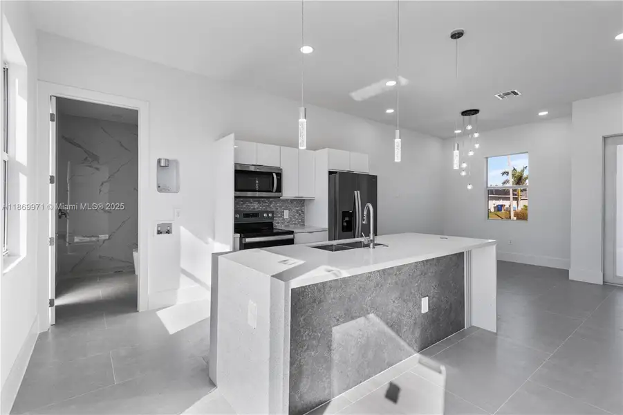 Furnished interior view inside a new home in , Lehigh Acres (Image 3).