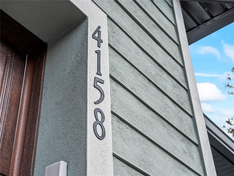 Exterior details and patio area of a home in , North Port (Image 35).