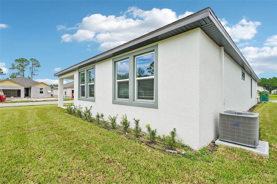 Exterior details and patio area of a home in Legends Preserve - Signature Series, Daytona Beach (Image 3).
