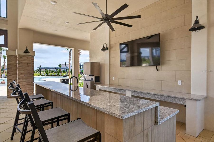 Exterior details and patio area of a home in Caldera, Spring Hill (Image 29).