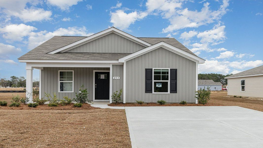Front exterior of a new home in Sandpiper Place, Myrtle Beach, SC, highlighting curb appeal (Image 2). Front exterior of a new home in Sandpiper Place, Myrtle Beach, SC, highlighting curb appeal (Image 2).