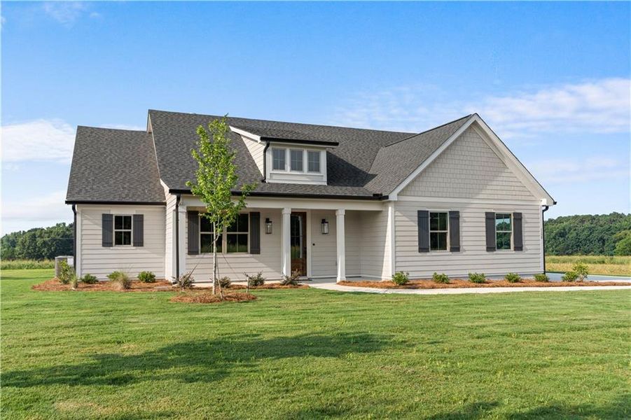 Front exterior of a new home in , Madison, GA, highlighting curb appeal (Image 27). Front exterior of a new home in , Madison, GA, highlighting curb appeal (Image 27).