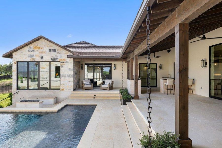 Exterior details and patio area of a home in , Spicewood (Image 4).
