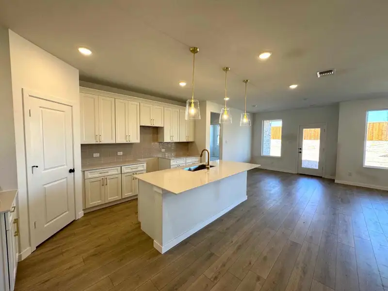 Open Kitchen-Dining Room Construction Progress featuring the Serene Collection