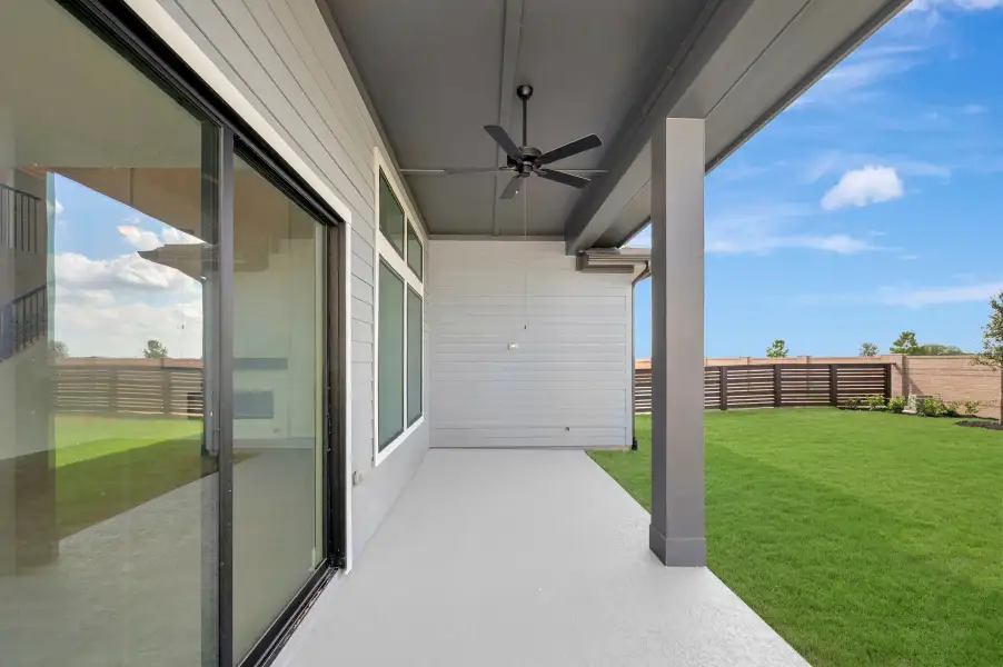 Exterior details and patio area of a home in Bridgeland Central: Emerald Heights - Enclave Collection, Cypress (Image 4).