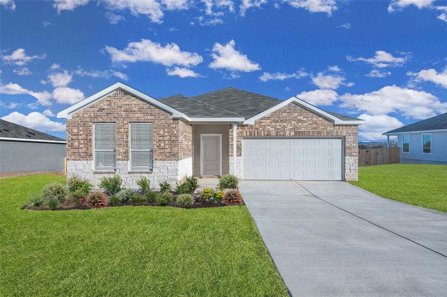 Front exterior of a new home in Windrose Green, Angleton, TX, highlighting curb appeal (Image 2).