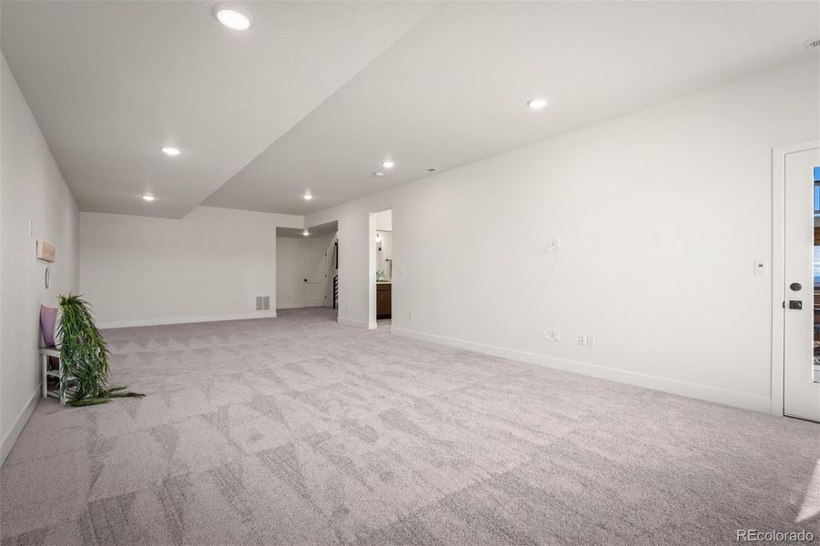 Spacious, unfurnished interior of a new home in Revel Crossing at Wolf Ranch - The Panorama Collection, Colorado Springs (Image 22).