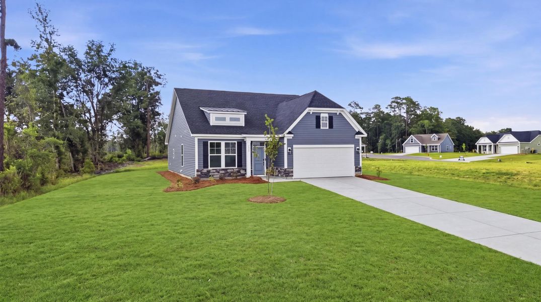 Front exterior of a new home in Oak Grove, Conway, SC, highlighting curb appeal (Image 18).