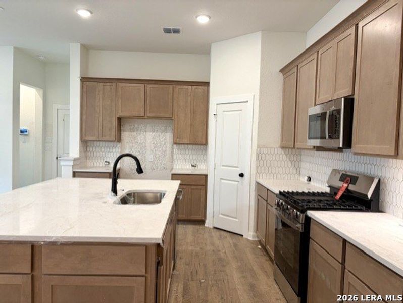 Furnished interior view inside a new home in The Crossvine, Schertz (Image 9).