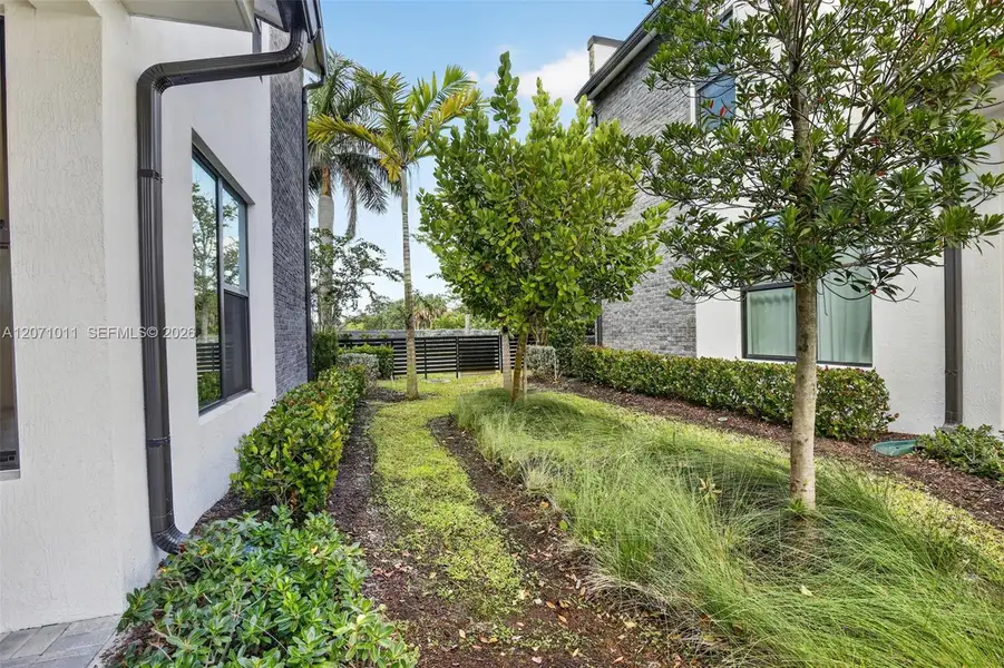 Exterior details and patio area of a home in , Plantation (Image 24).