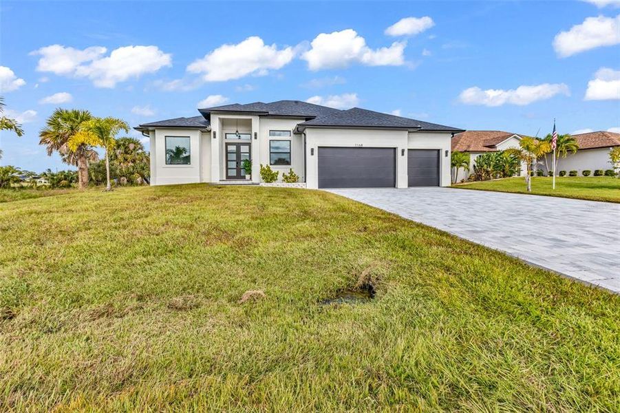 Front exterior of a new home in , Rotonda West, FL, highlighting curb appeal (Image 30). Front exterior of a new home in , Rotonda West, FL, highlighting curb appeal (Image 30).