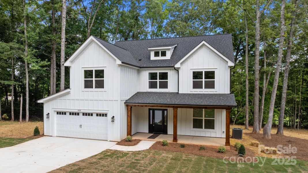Front exterior of a new home in , Waxhaw, NC, highlighting curb appeal (Image 2). Front exterior of a new home in , Waxhaw, NC, highlighting curb appeal (Image 2).