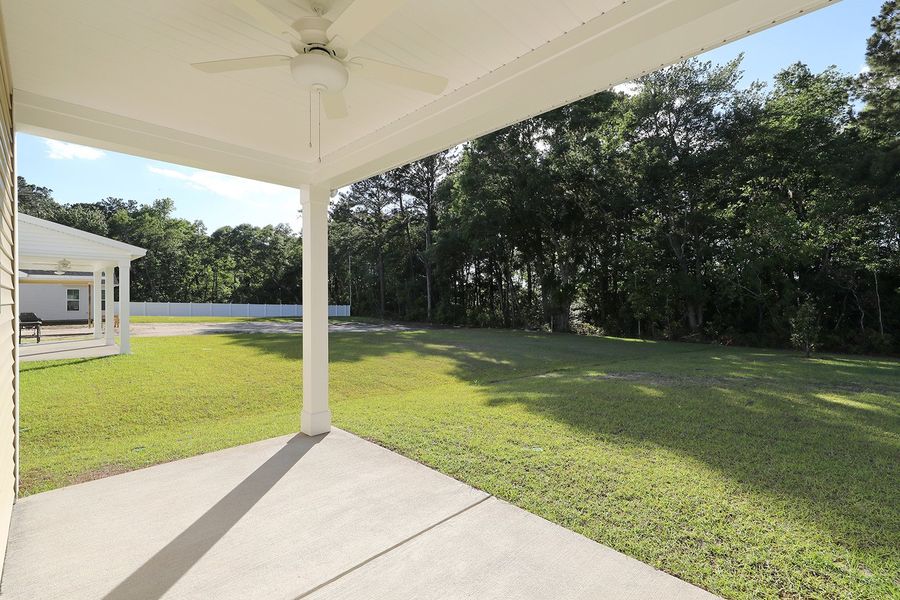 Exterior details and patio area of a home in Arcadia, Myrtle Beach (Image 4).