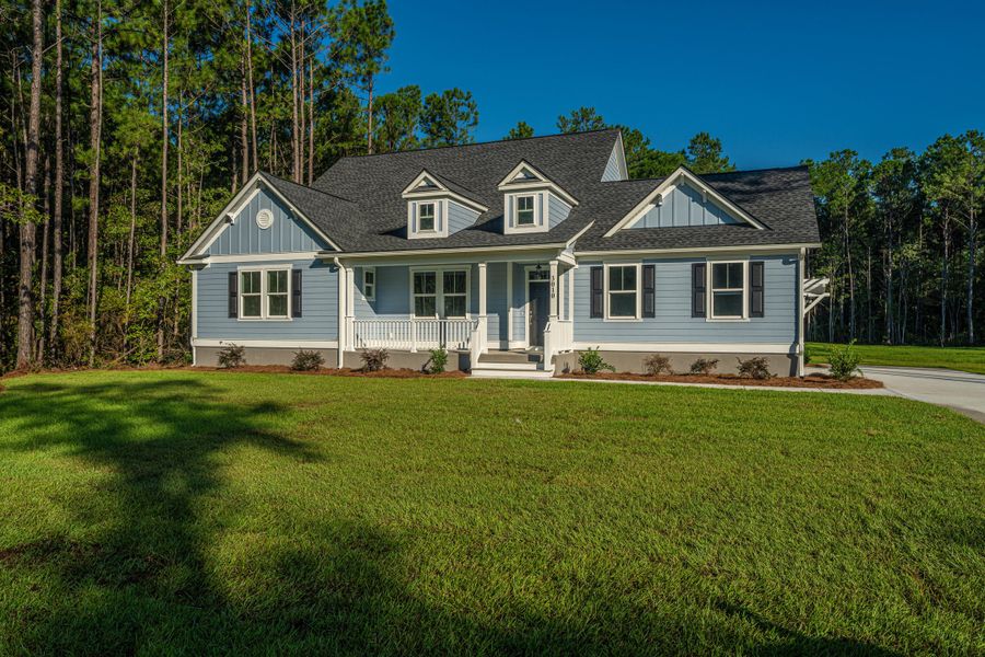 Front exterior of a new home in , Awendaw, SC, highlighting curb appeal (Image 13).