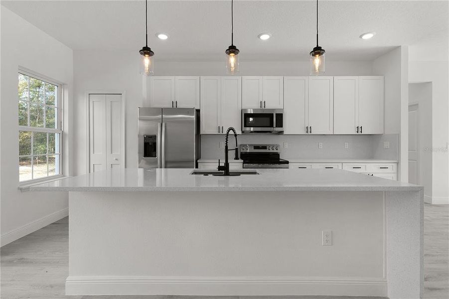 Kitchen island with breakfast bar