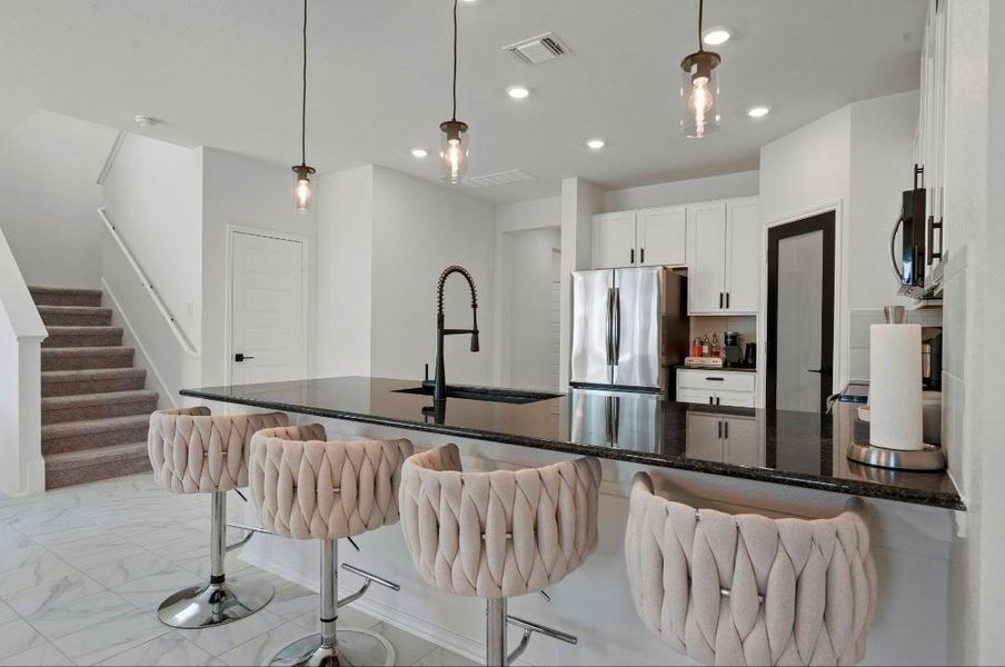 Furnished interior view inside a new home in Sonterra - Cool Water, Jarrell (Image 7).