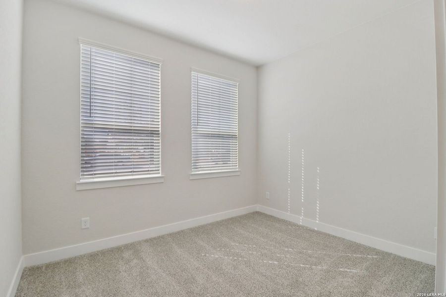 Spacious, unfurnished interior of a new home in Village at Three Oaks, Seguin (Image 11).