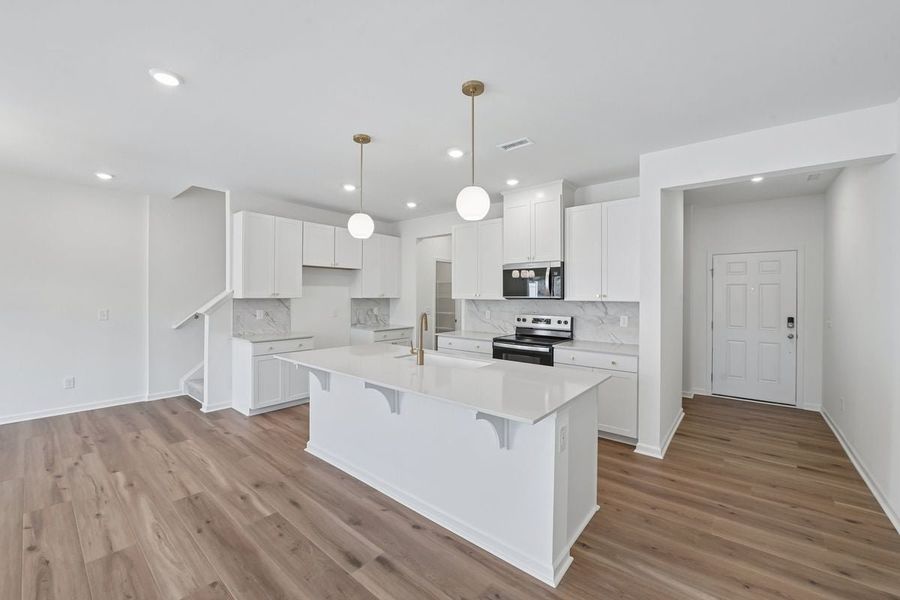 Furnished interior view inside a new home in Brooks Mill - Reserve Series, Durham (Image 5).
