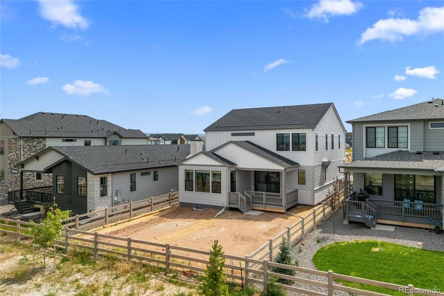 Front exterior of a new home in Harmony at Sterling Ranch, Littleton, CO, highlighting curb appeal (Image 1).