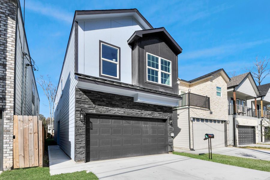 Front exterior of a new home in , Houston, TX, highlighting curb appeal (Image 20).