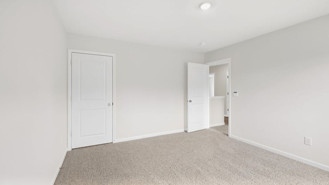 Spacious, unfurnished interior of a new home in Durbin Meadows Traditions, Fountain Inn (Image 28).