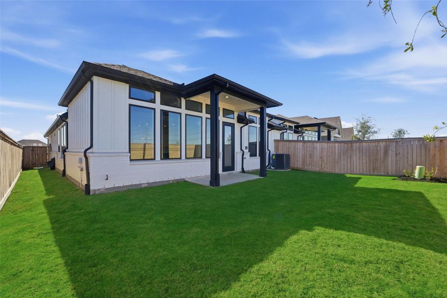 Exterior details and patio area of a home in , Cypress (Image 4).
