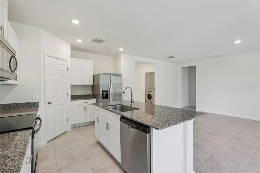 Furnished interior view inside a new home in Bradbury Creek - Signature Series, Haines City (Image 4).