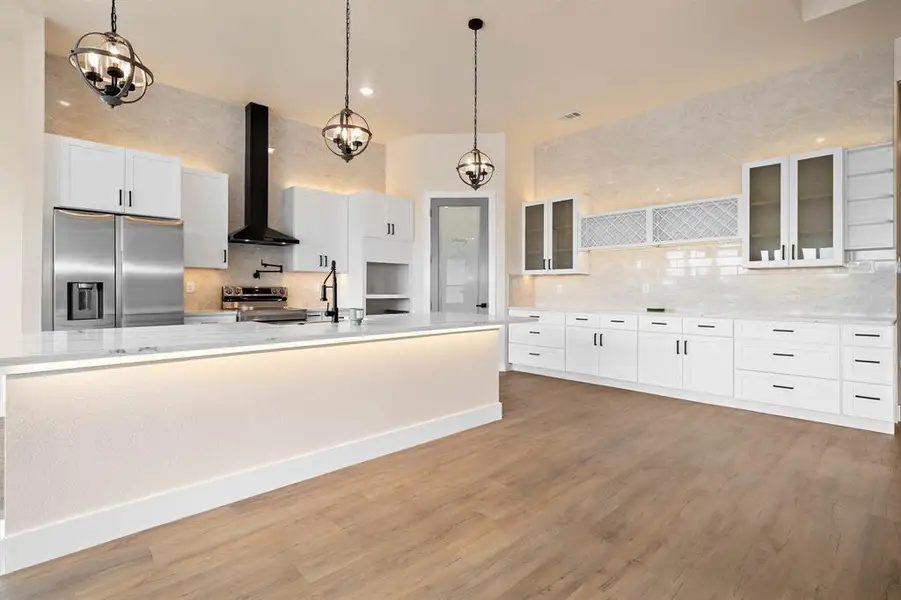 Furnished interior view inside a new home in , Whitney (Image 7).