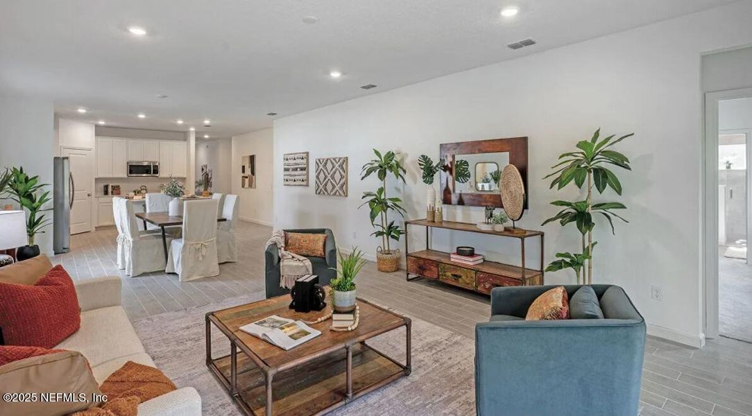 Furnished interior view inside a new home in Edenbrooke at Hyland Trail | 55+: Edenbrooke at Hyland Trail 50s, Green Cove Springs (Image 6). Furnished interior view inside a new home in Edenbrooke at Hyland Trail | 55+: Edenbrooke at Hyland Trail 50s, Green Cove Springs (Image 6).