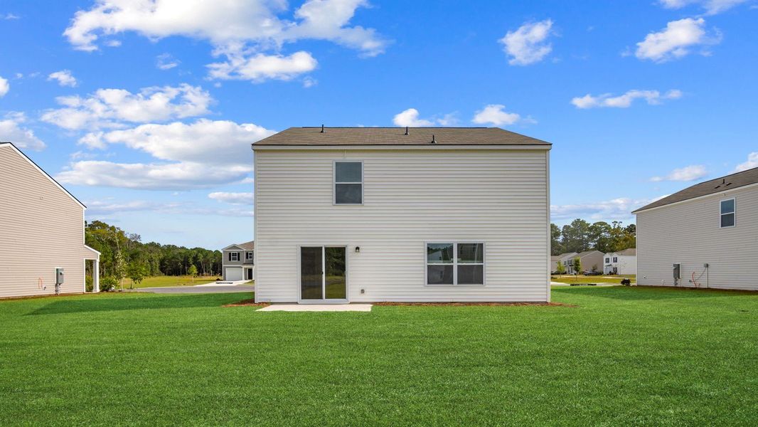 Exterior details and patio area of a home in Longleaf Village, Rincon (Image 3).