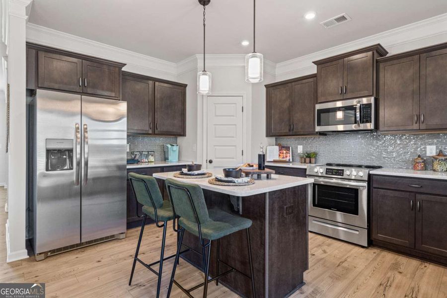 Furnished interior view inside a new home in Bryson Farms, Byron (Image 8).