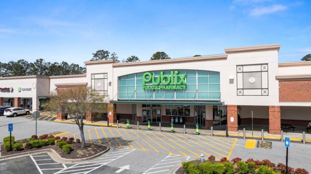 Front exterior of a new home in Fairhaven, Lithia Springs, GA, highlighting curb appeal (Image 39). Front exterior of a new home in Fairhaven, Lithia Springs, GA, highlighting curb appeal (Image 39).