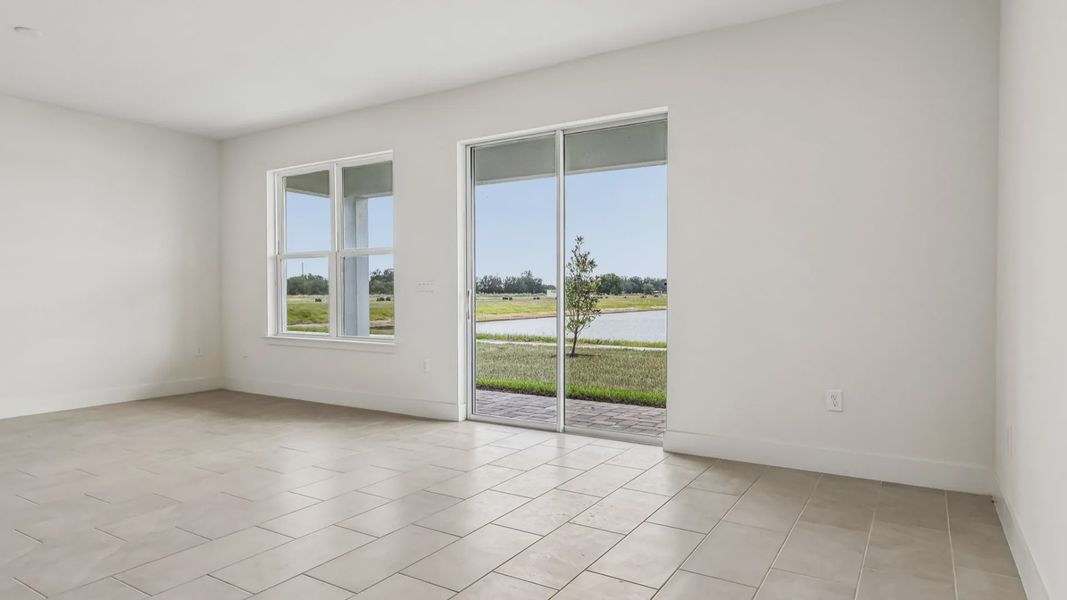 Furnished interior view inside a new home in Ardisia Park, New Smyrna Beach (Image 7).