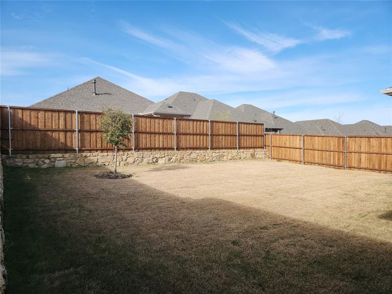 Exterior details and patio area of a home in Ashford Park - Texana Series, Corinth (Image 4).