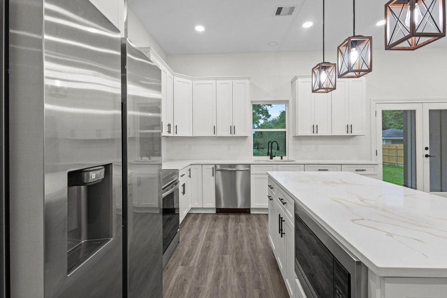 Furnished interior view inside a new home in , Orange (Image 10). Furnished interior view inside a new home in , Orange (Image 10).