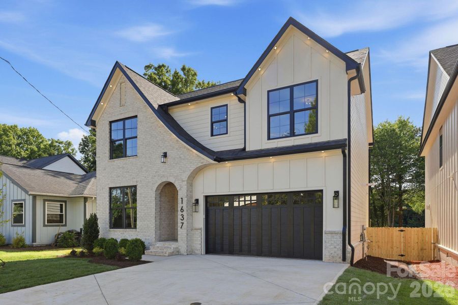 Front exterior of a new home in , Charlotte, NC, highlighting curb appeal (Image 25). Front exterior of a new home in , Charlotte, NC, highlighting curb appeal (Image 25).