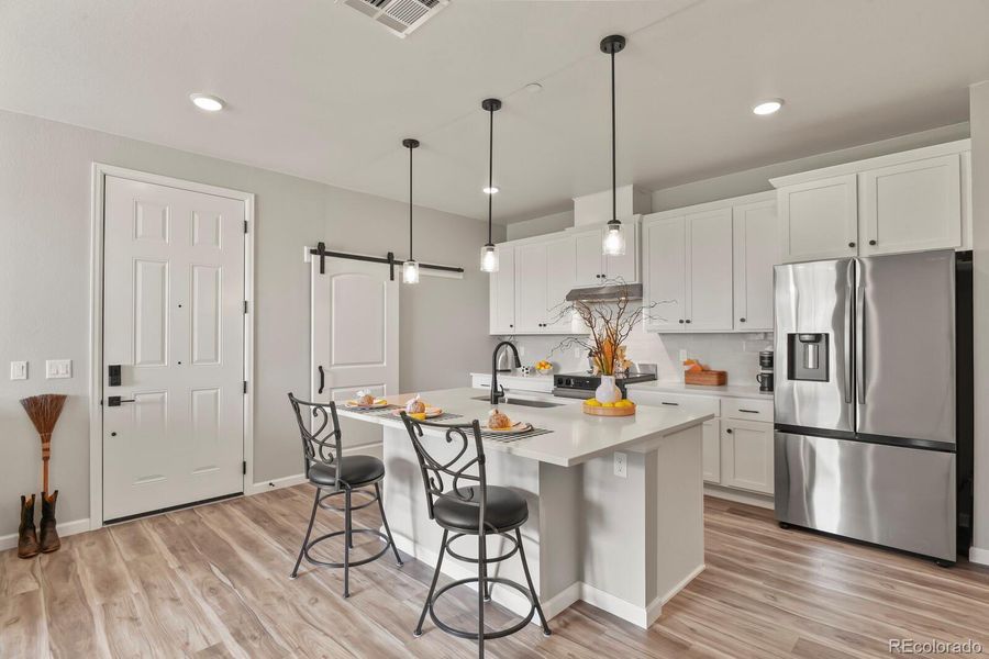 Furnished interior view inside a new home in Stonegate Condos, Parker (Image 10).