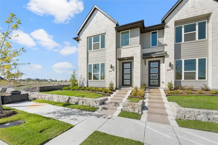 Front exterior of a new home in Talia, Mesquite, TX, highlighting curb appeal (Image 1).