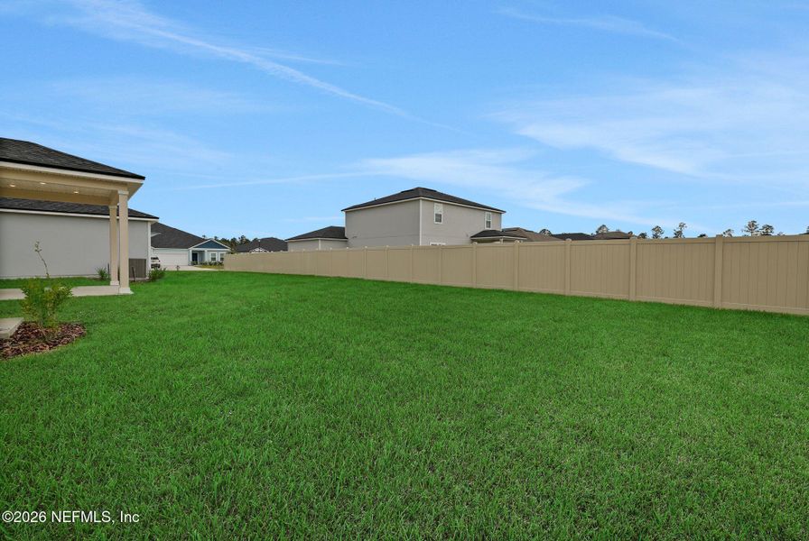 Exterior details and patio area of a home in Wilford Oaks, Orange Park (Image 25).