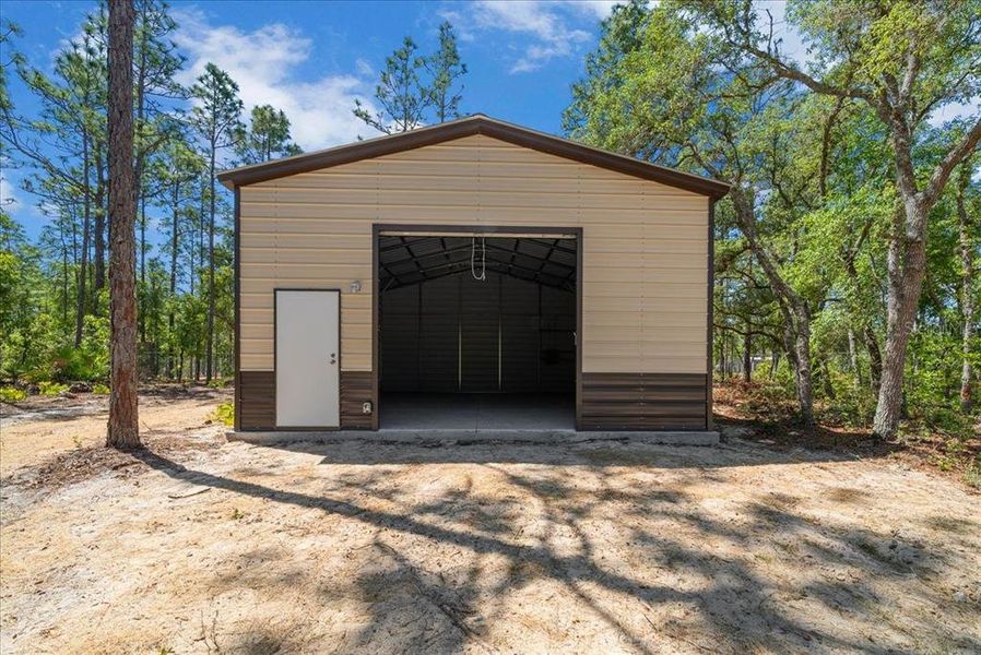 Front exterior of a new home in , Ocala, FL, highlighting curb appeal (Image 26).
