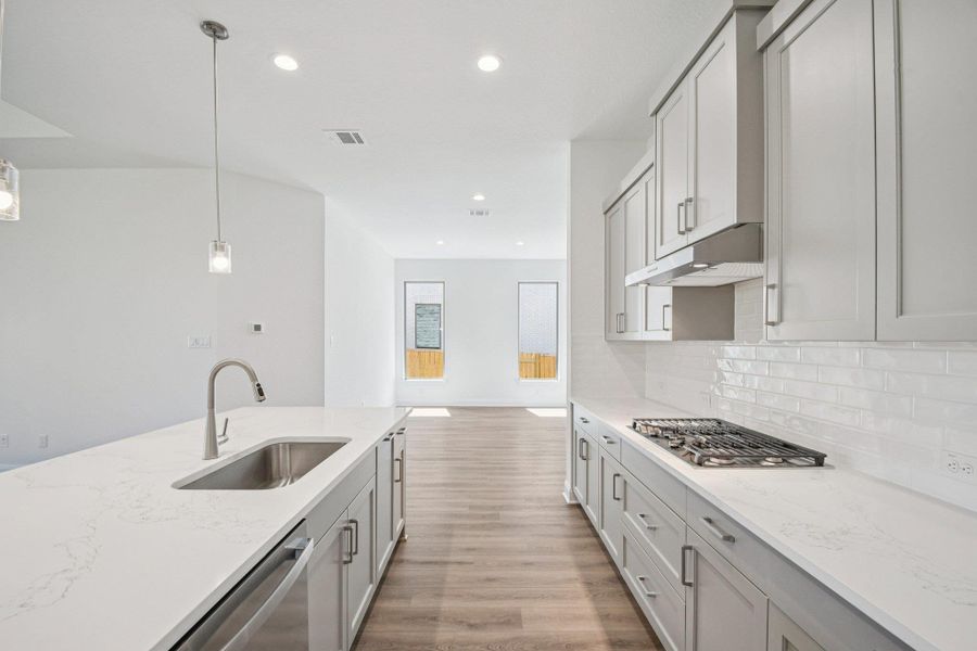 Furnished interior view inside a new home in 6 Creeks, Kyle (Image 5).