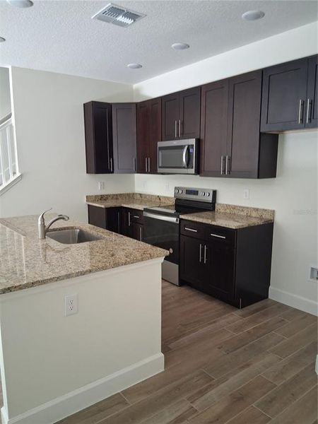 Furnished interior view inside a new home in , New Smyrna Beach (Image 11).