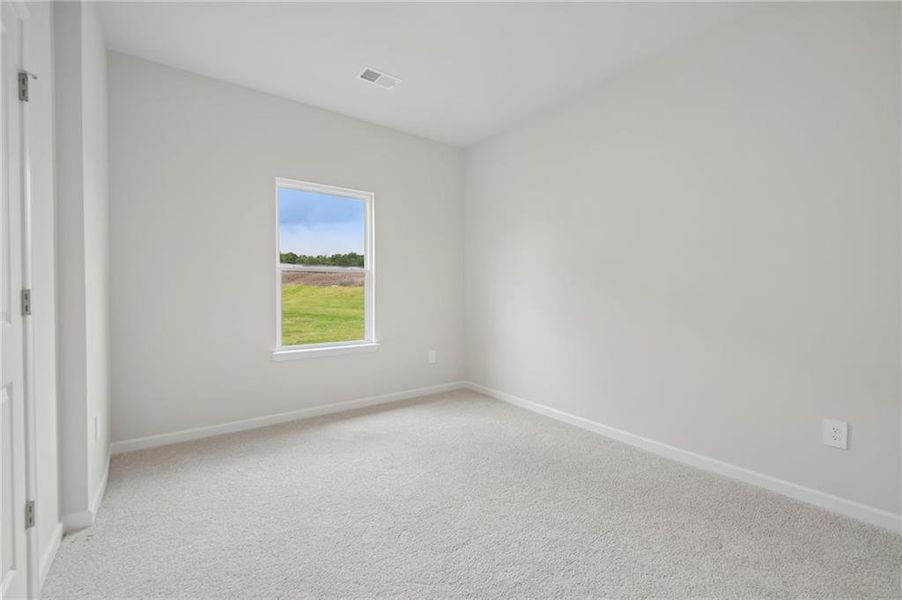 Spacious, unfurnished interior of a new home in Northwoods at Mirror Lake, Villa Rica (Image 23).
