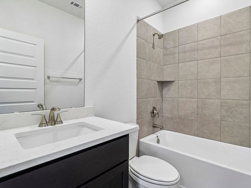 Furnished interior view inside a new home in Colony at Cole Springs - Boulevard Collection, Buda (Image 8).