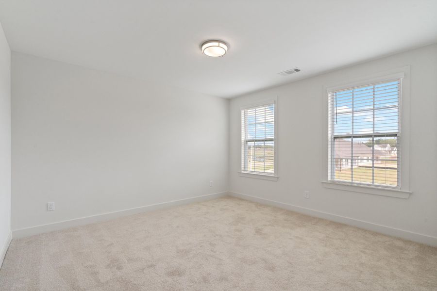Neutral wall color with two large windows Neutral wall color with two large windows