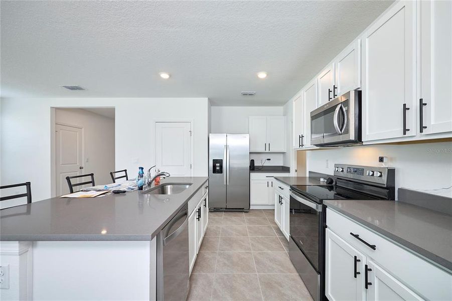 Furnished interior view inside a new home in Westgate at Avalon Park, Wesley Chapel (Image 32).